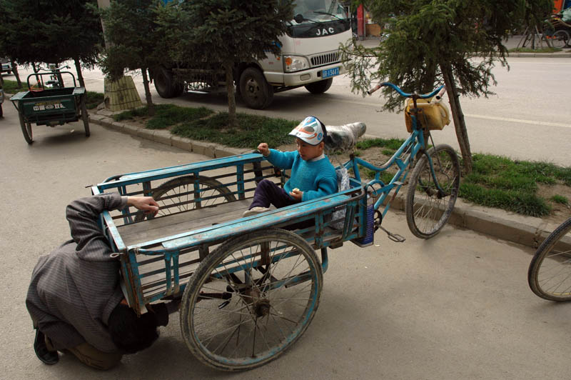 Family vehicle maintenance (with a hammer)